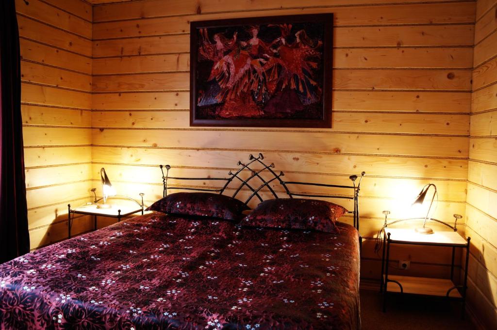 Postel nebo postele na pokoji v ubytování Villa Iris