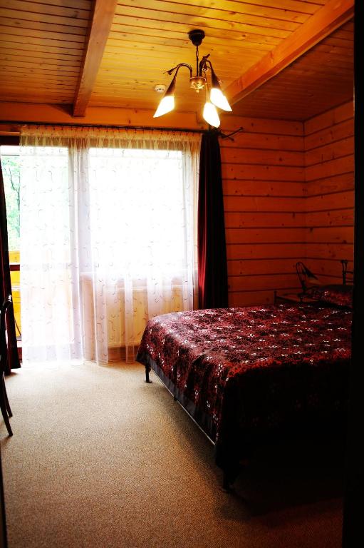 Postel nebo postele na pokoji v ubytování Villa Iris