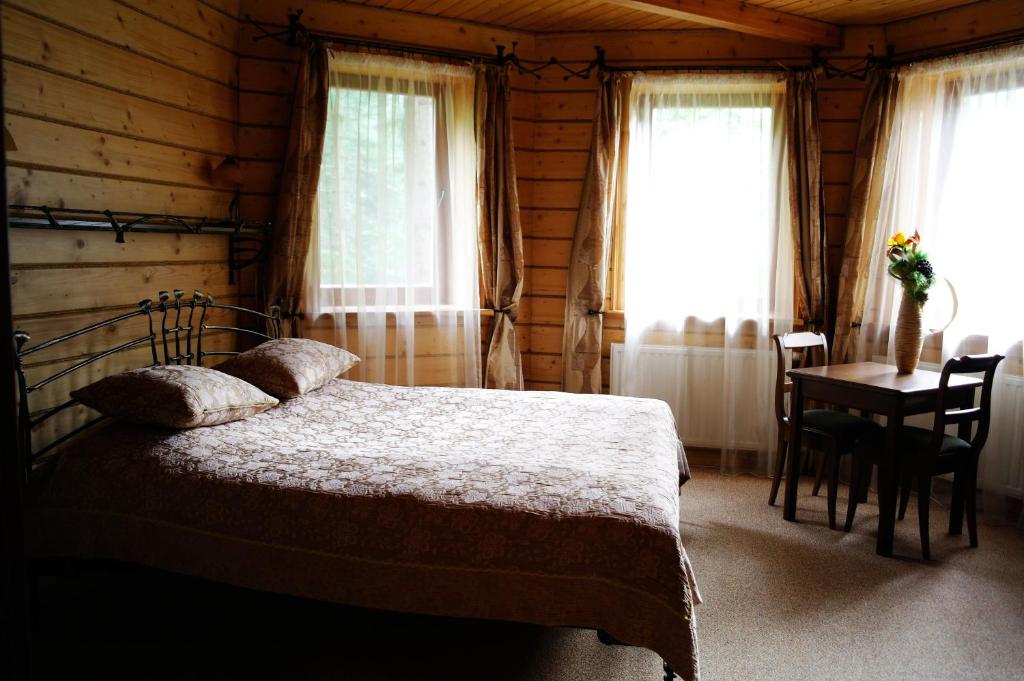 Postel nebo postele na pokoji v ubytování Villa Iris