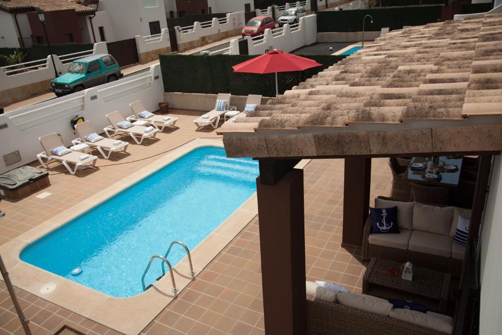 Bazén v ubytování VILLA DREAMS - VILLAS LA ESTANCIA - nebo v jeho okolí