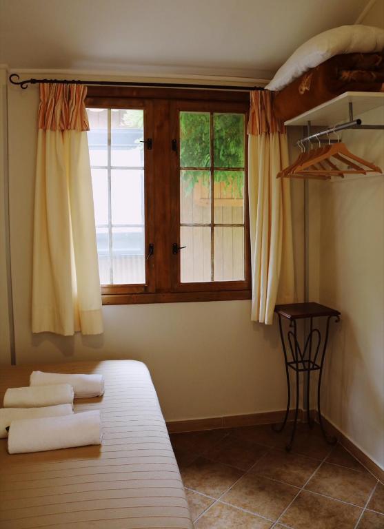 Łóżko lub łóżka w pokoju w obiekcie Agriturismo San Leonardo