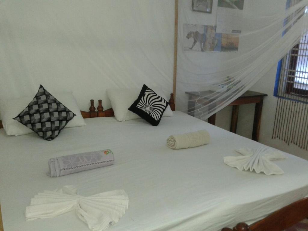 Postel nebo postele na pokoji v ubytování Star Rest Beach Hotel