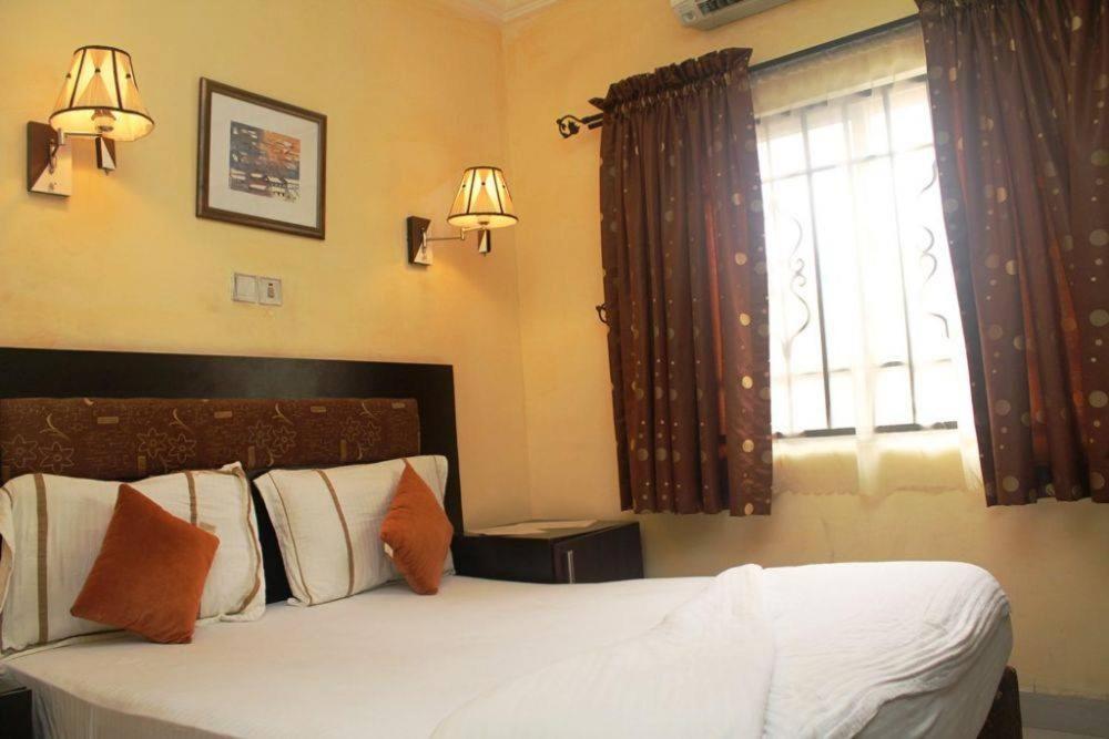 Postel nebo postele na pokoji v ubytování Chantella Suites