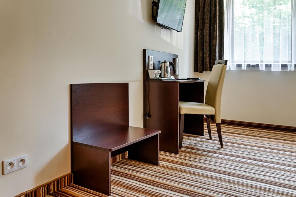 TV a/nebo společenská místnost v ubytování Boutique Hotel's Kwiska - Legnicka