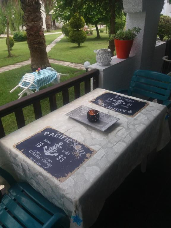 a table with two placemats on top of it at Siviri family house Oikismos Akri - Koroni in Siviri