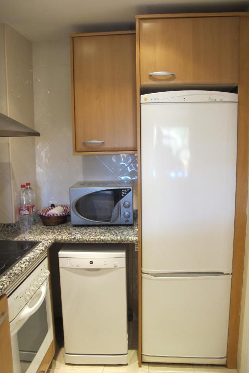 Kuchyň nebo kuchyňský kout v ubytování Apartamento en Los Patios de Santa Maria Golf