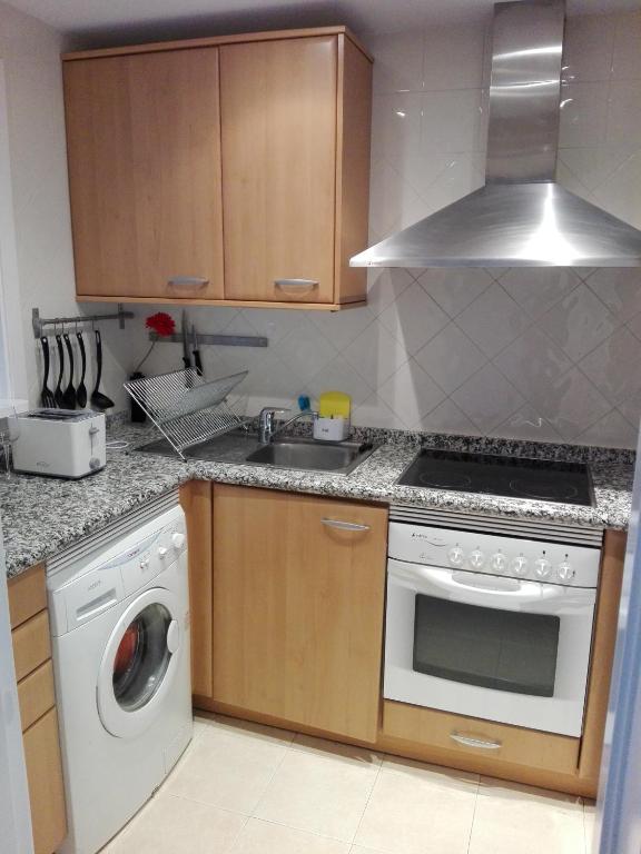 Kuchyň nebo kuchyňský kout v ubytování Apartamento en Los Patios de Santa Maria Golf