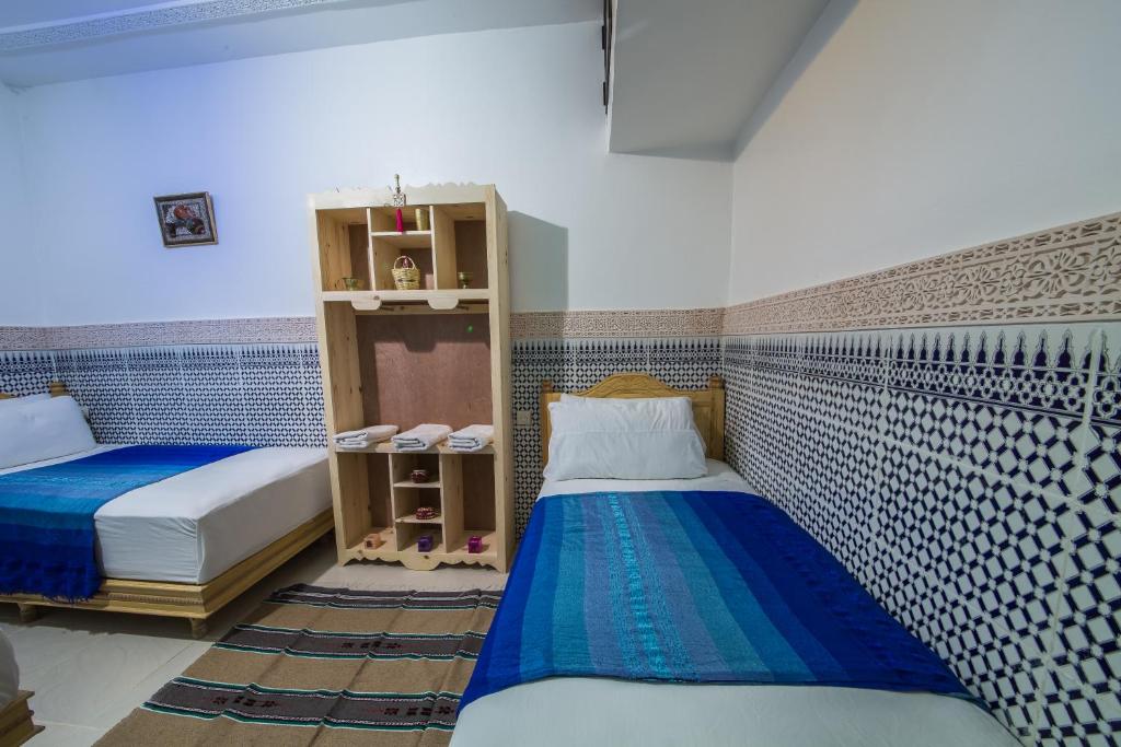 Postel nebo postele na pokoji v ubytování La Casa Espanyola