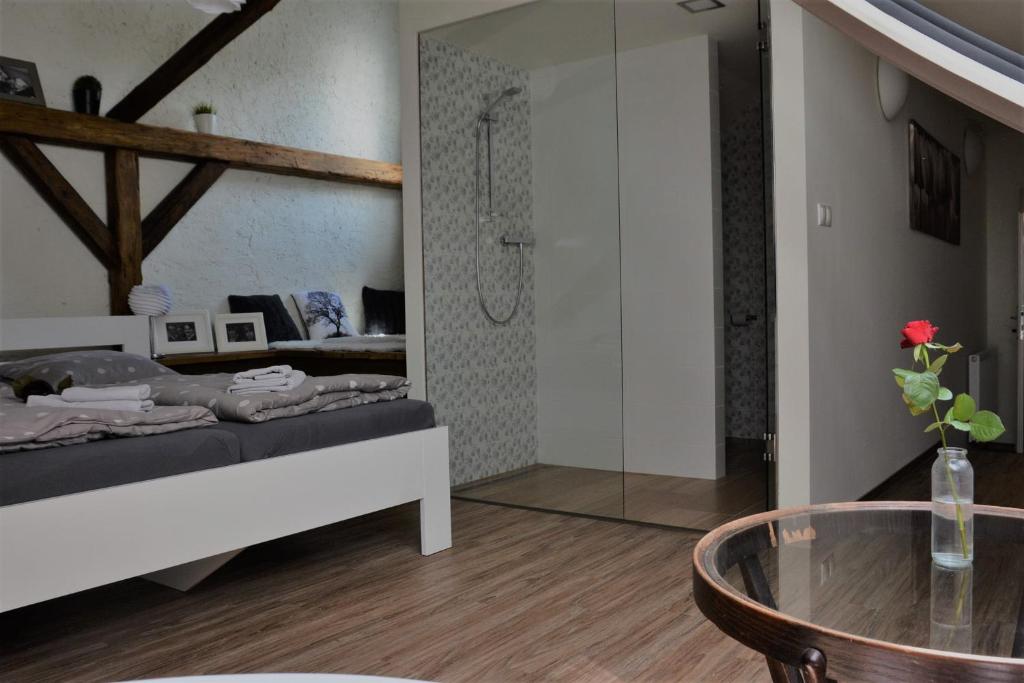 Postel nebo postele na pokoji v ubytování Penzion a relax centrum Andělka