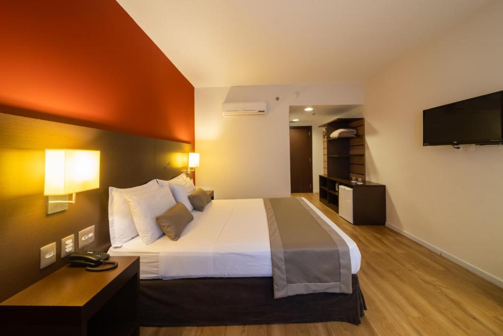Cama o camas de una habitación en Hotel Panamby São Paulo