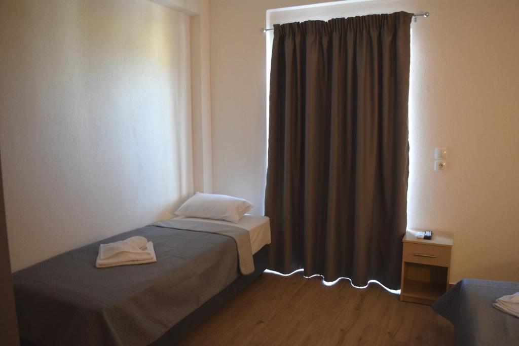 A bed or beds in a room at Littore Maris