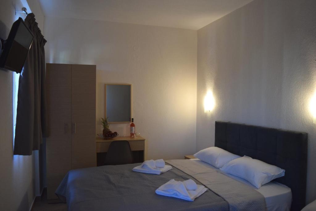 A bed or beds in a room at Littore Maris