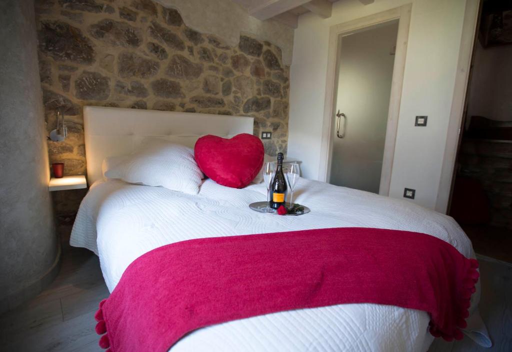 Postel nebo postele na pokoji v ubytování Casa Maru