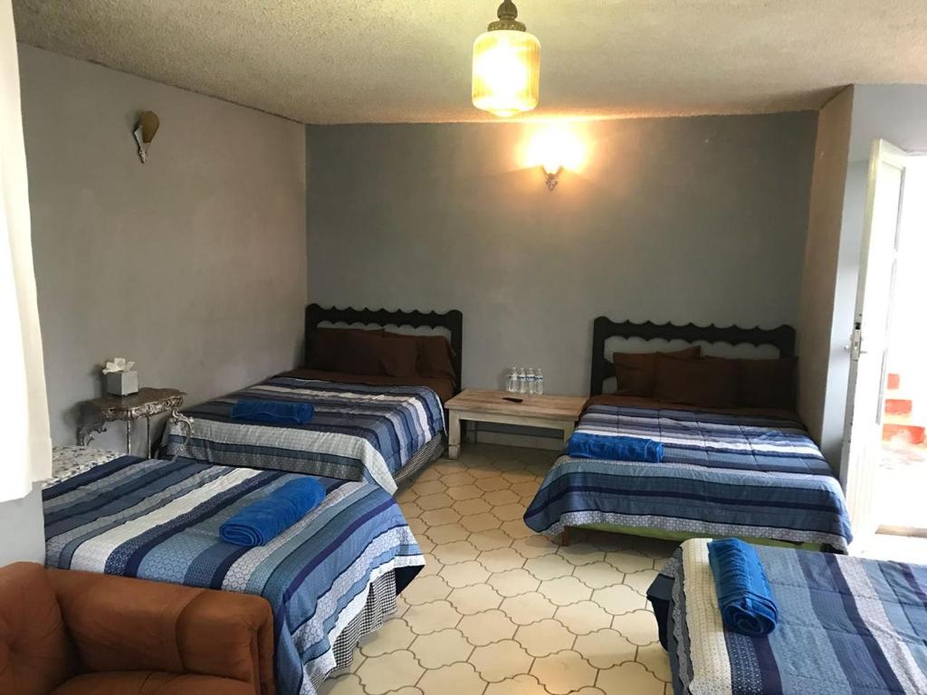 Postel nebo postele na pokoji v ubytování Casa Antaña