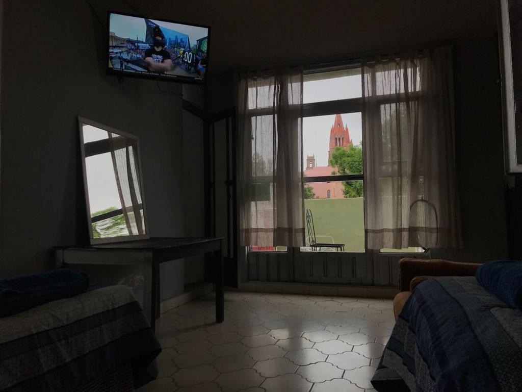 TV a/nebo společenská místnost v ubytování Casa Antaña