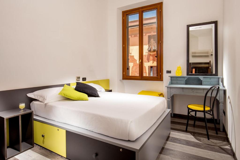Postel nebo postele na pokoji v ubytování Free Hostels Roma