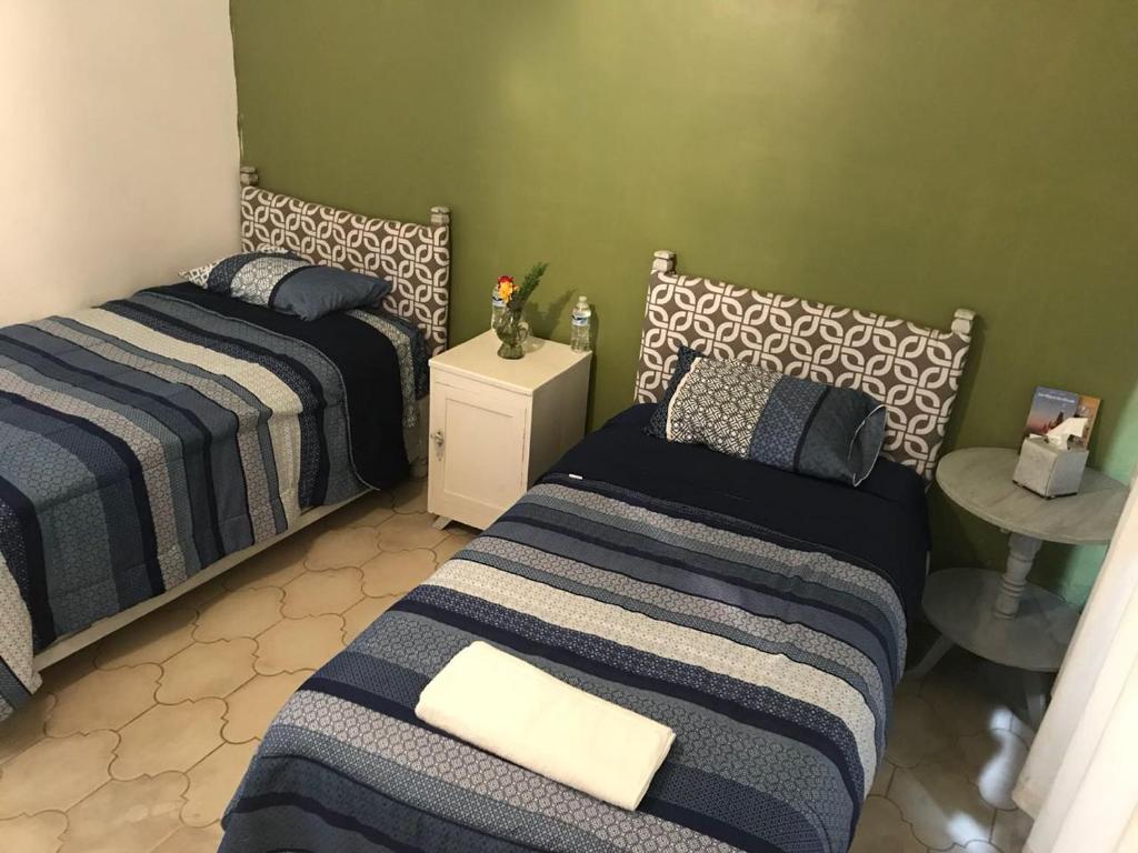 Postel nebo postele na pokoji v ubytování Casa Antaña
