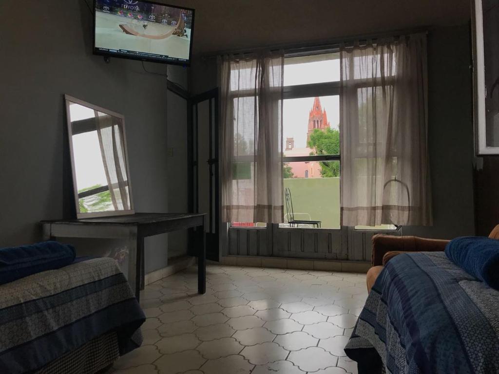 Postel nebo postele na pokoji v ubytování Casa Antaña