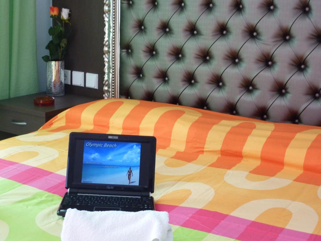 Postel nebo postele na pokoji v ubytování Hotel White Rose Beach