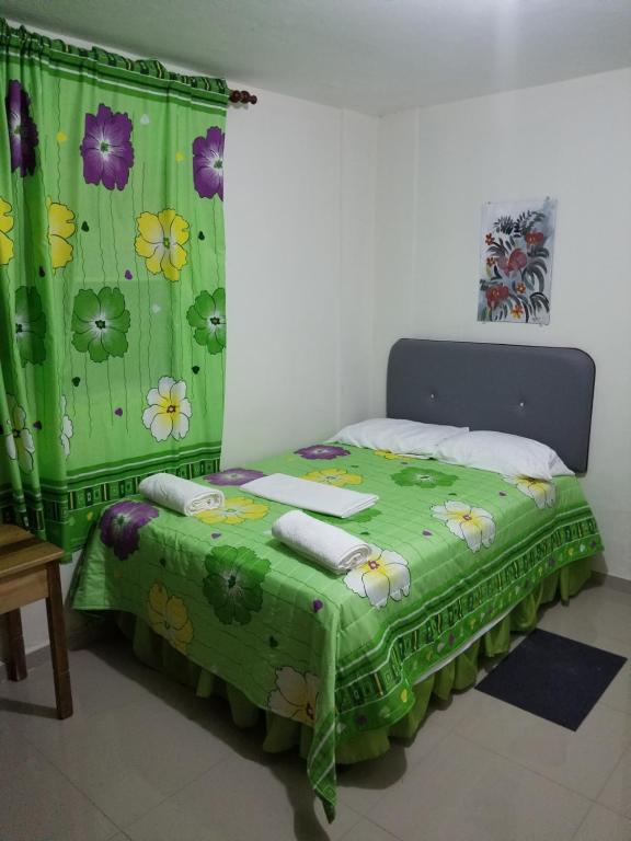 Postel nebo postele na pokoji v ubytování Hostel Quintonido