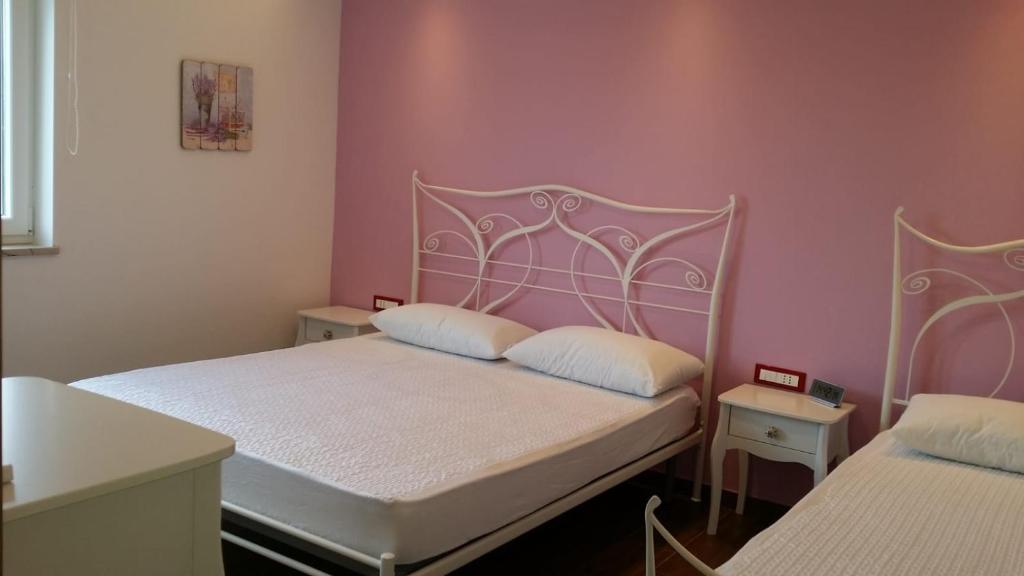 Postel nebo postele na pokoji v ubytování Diva Star Bol