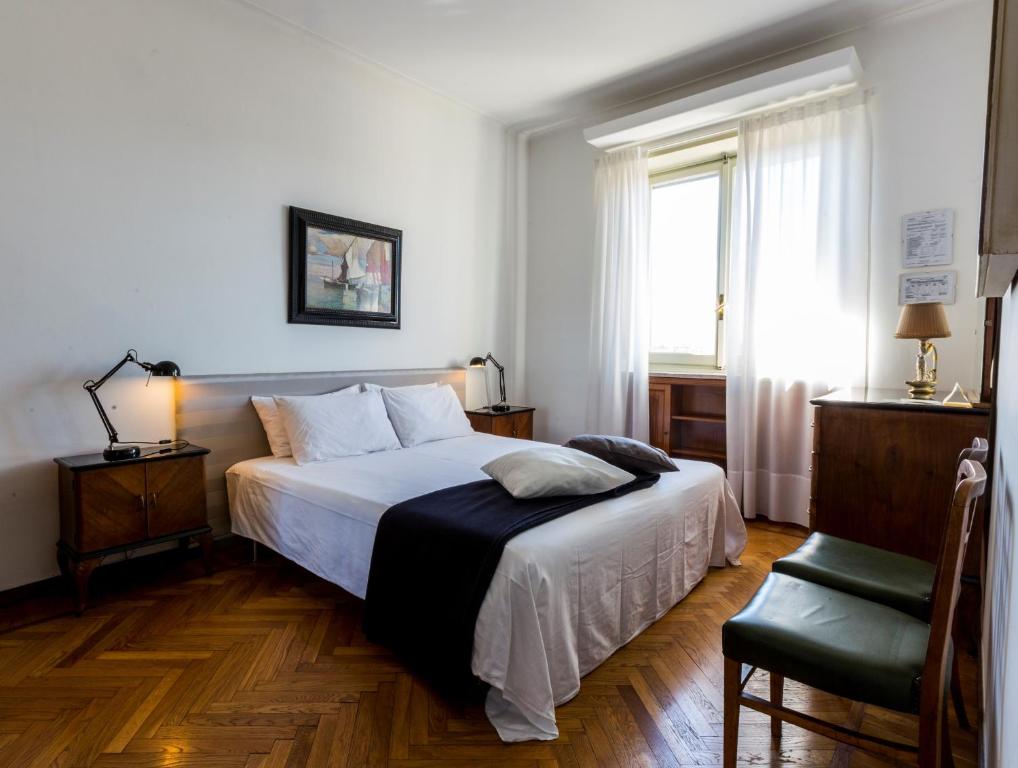 Posteľ alebo postele v izbe v ubytovaní Gianduja B&B