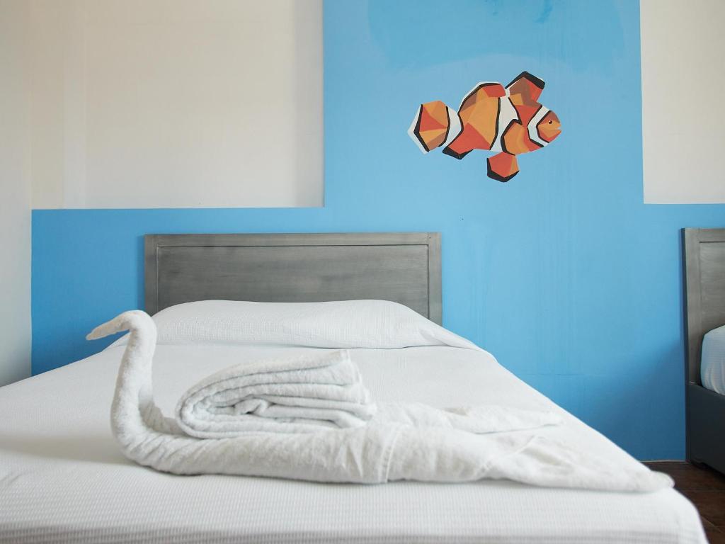 Postel nebo postele na pokoji v ubytování Hotel Tabasco Rio