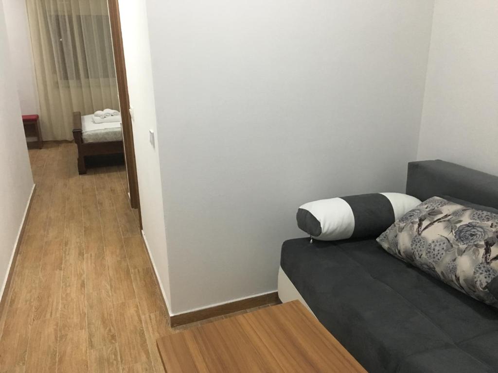 Postel nebo postele na pokoji v ubytování Robi Apartments