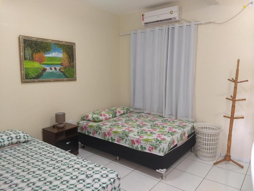 Postel nebo postele na pokoji v ubytování Porto dos Lencóis - Chalé Tipo Apartamento