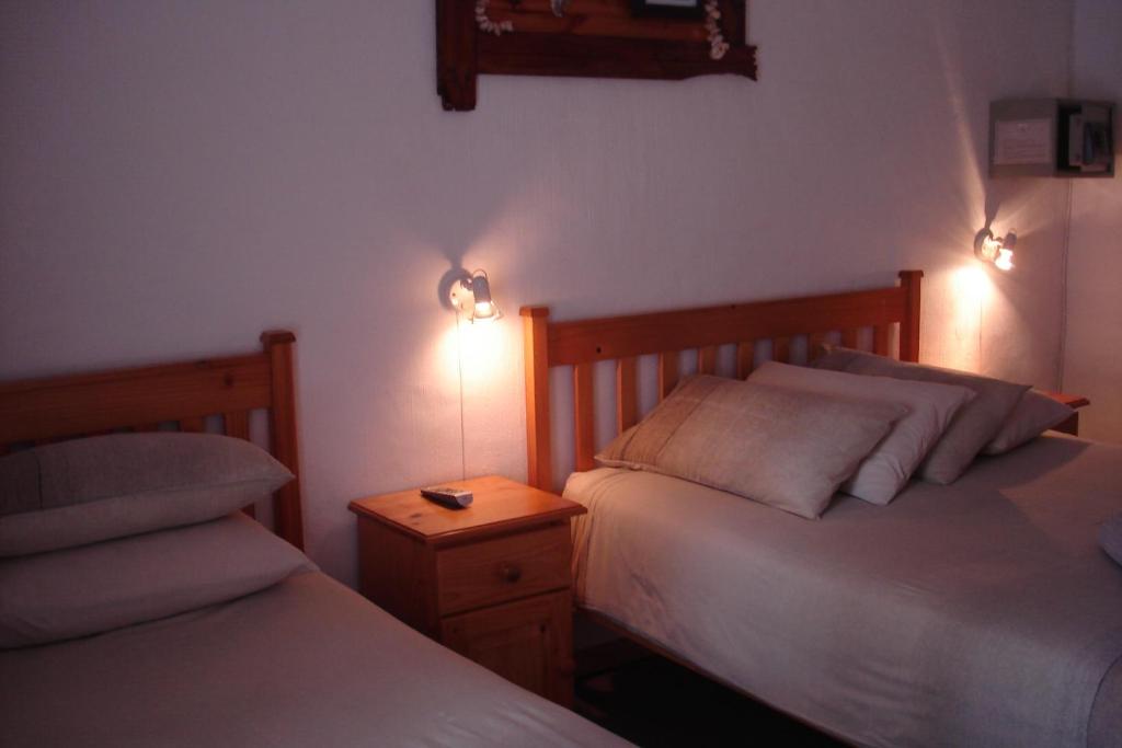 Postel nebo postele na pokoji v ubytování Bay Cove Inn