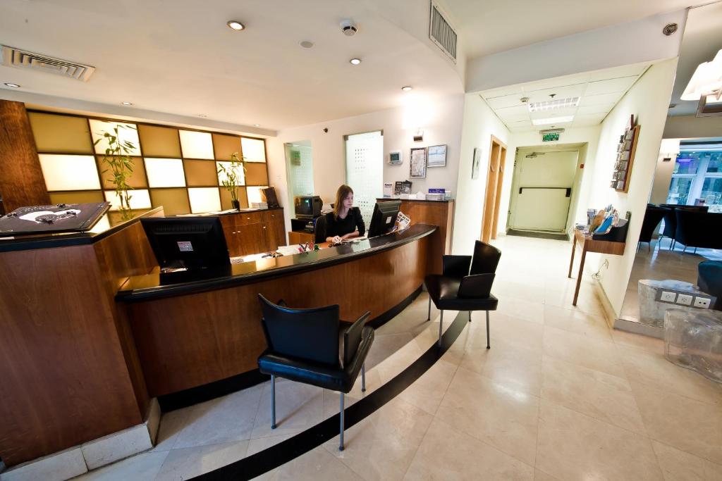 TV a/nebo společenská místnost v ubytování SeaNet Hotel By AFI Hotels