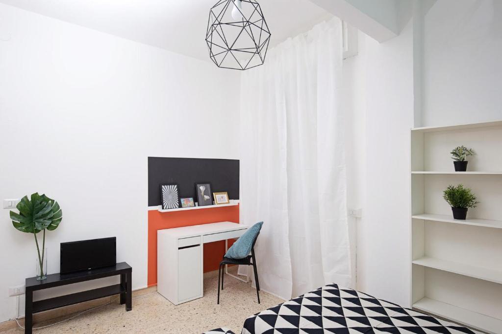 TV a/nebo společenská místnost v ubytování Ponte Tiberio Apartment