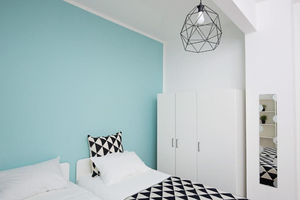 Postel nebo postele na pokoji v ubytování Ponte Tiberio Apartment
