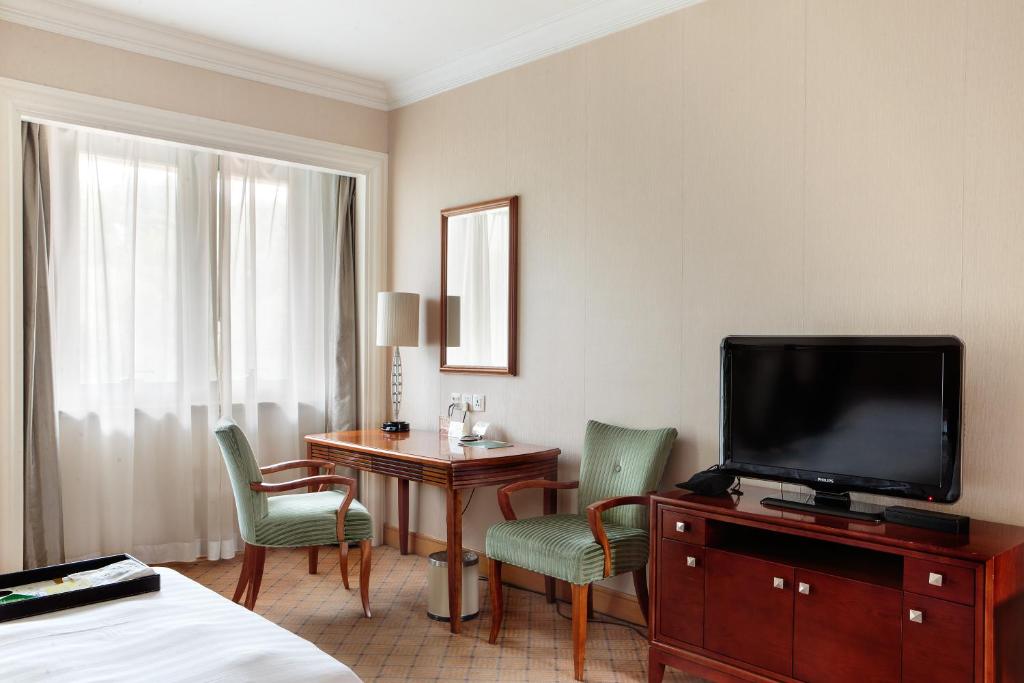 TV a/nebo společenská místnost v ubytování Hong Qiao State Guest House