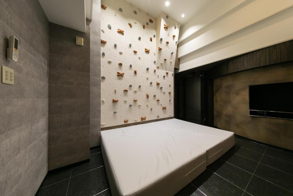 Postel nebo postele na pokoji v ubytování Hotel Eldia Modern Kobe(Adult Only)