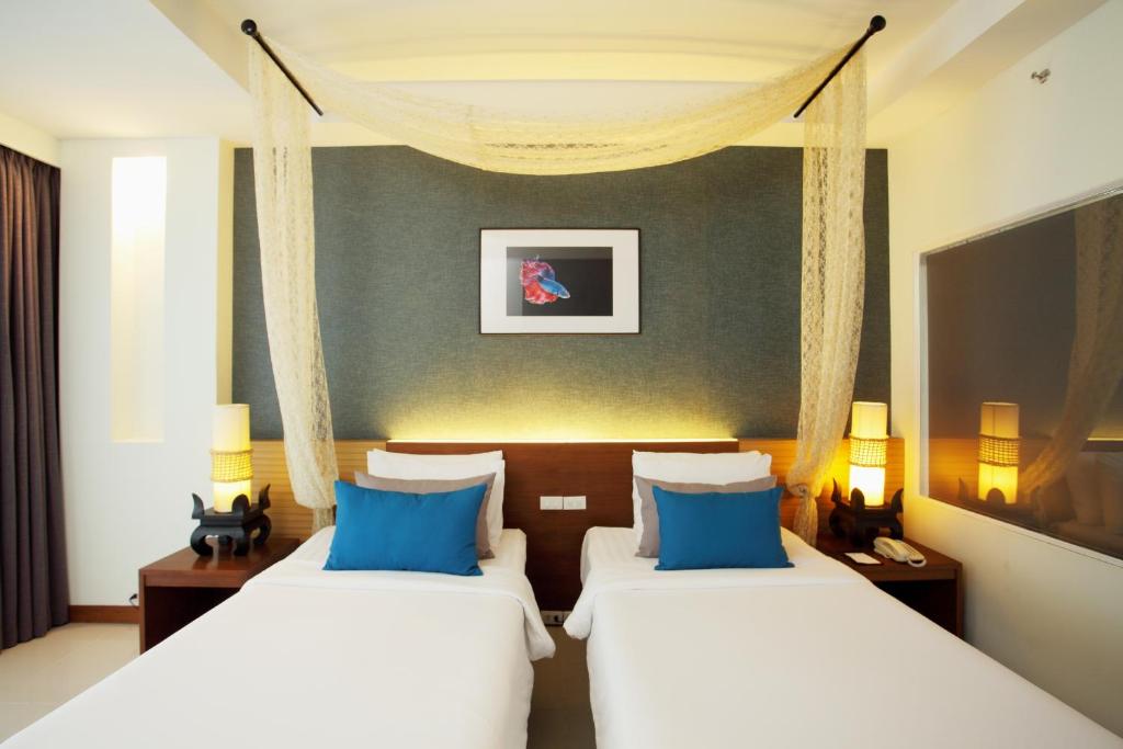 Postel nebo postele na pokoji v ubytování Access Resort & Villas - SHA Plus