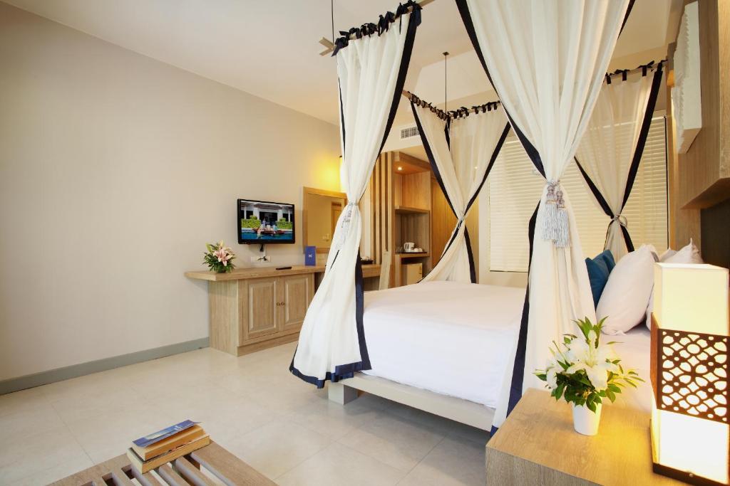 Postel nebo postele na pokoji v ubytování Access Resort & Villas - SHA Plus