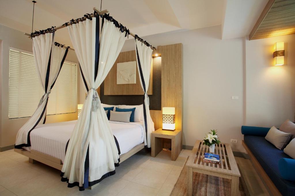 Postel nebo postele na pokoji v ubytování Access Resort & Villas - SHA Plus