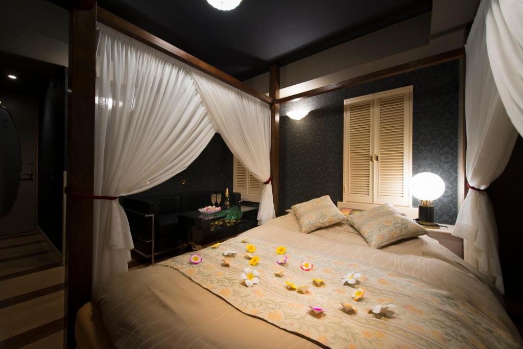 Postel nebo postele na pokoji v ubytování Hotel W-BAGUS -W GROUP HOTELS and RESORTS-