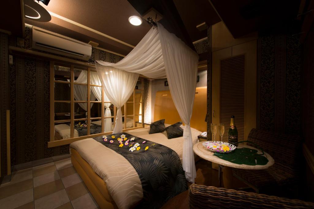 Postel nebo postele na pokoji v ubytování Hotel W-BAGUS -W GROUP HOTELS and RESORTS-