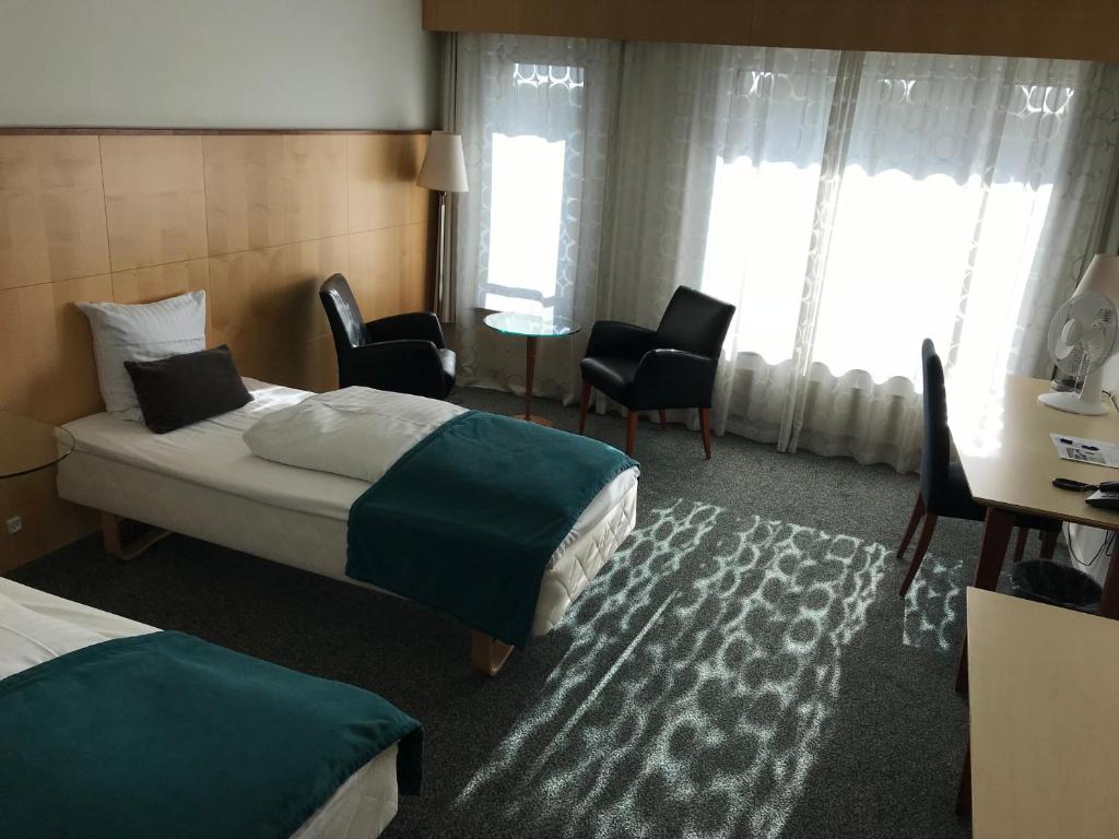 Postel nebo postele na pokoji v ubytování Glostrup Park Hotel