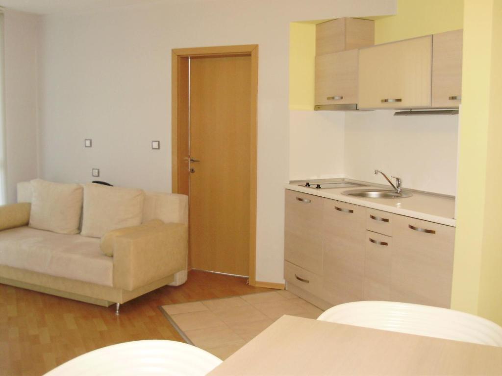 A kitchen or kitchenette at Aparthotel Marina Holiday Club - All Inclusive & Free Parking