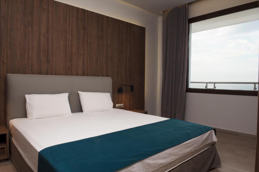 Postel nebo postele na pokoji v ubytování Mistral Hotel