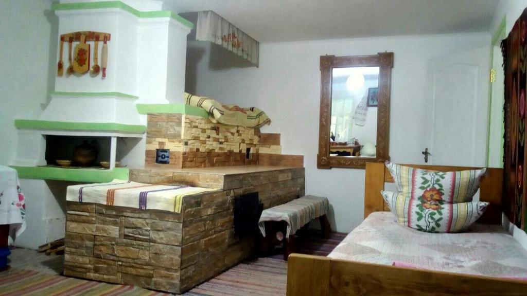 Postel nebo postele na pokoji v ubytování Dykyi Khutir