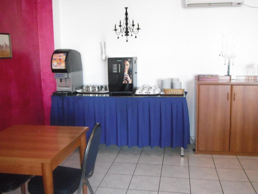Kuchyň nebo kuchyňský kout v ubytování Hôtel Sampiero