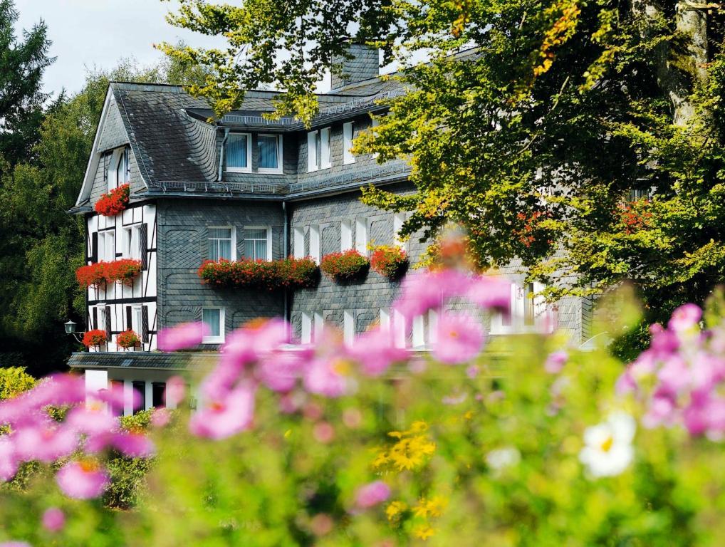 Een tuin van Hotel Jagdhaus Wiese
