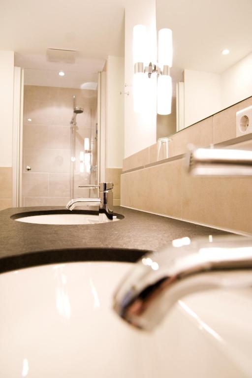 Een badkamer bij Hotel Jagdhaus Wiese