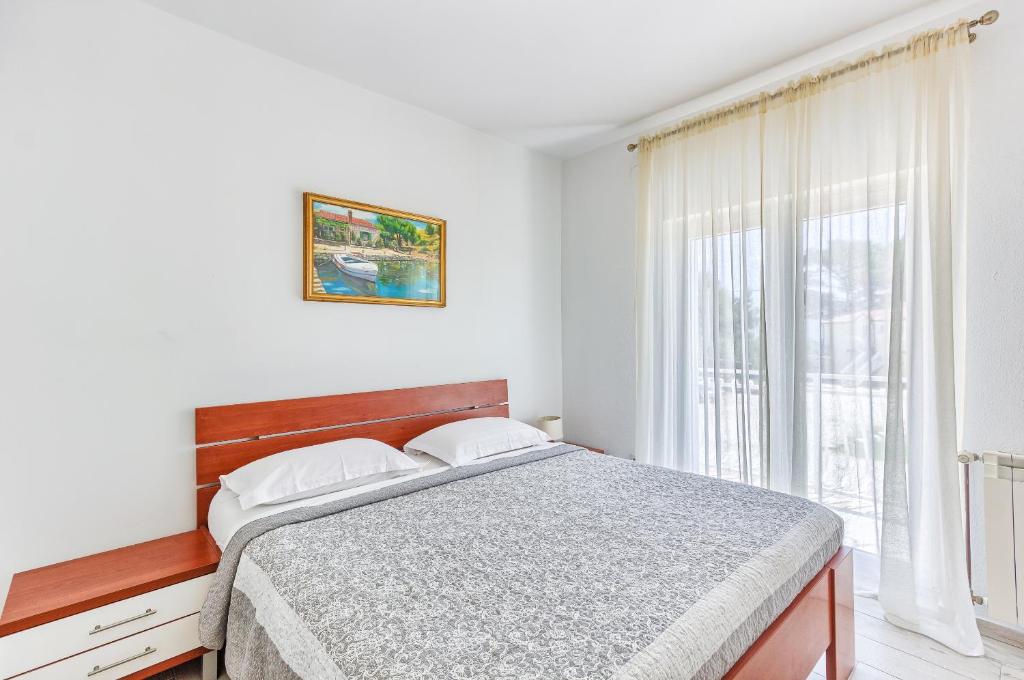 Apartments & Bungalows Ivanovićにあるベッド