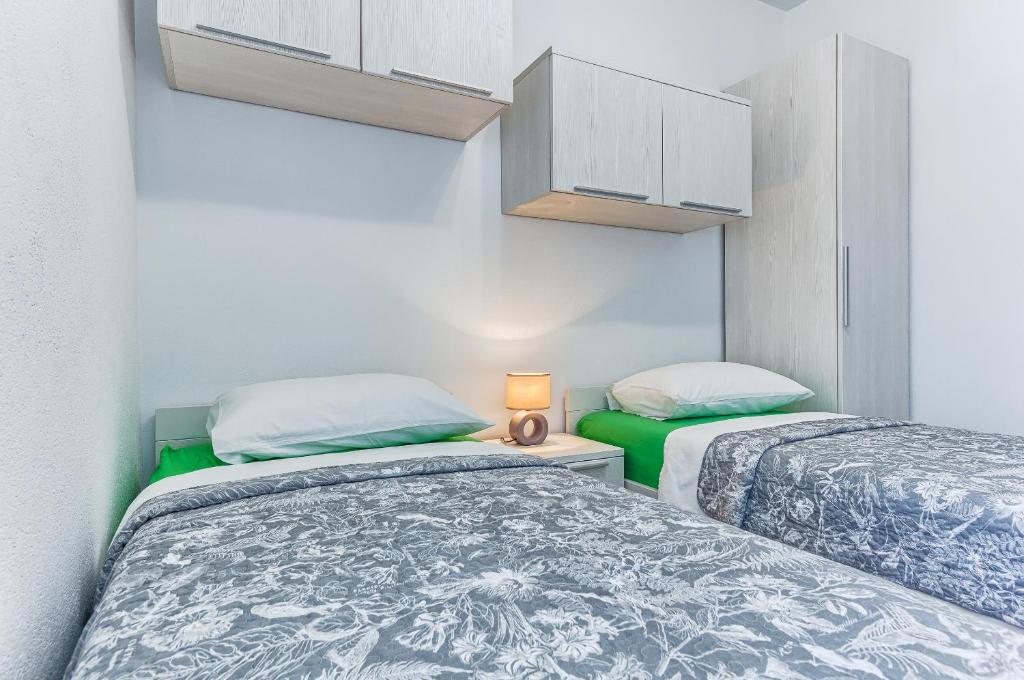 Apartments & Bungalows Ivanovićにあるベッド