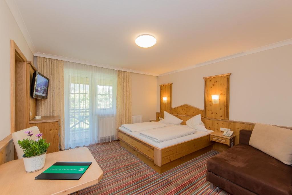 Posteľ alebo postele v izbe v ubytovaní Landhotel Oberdanner